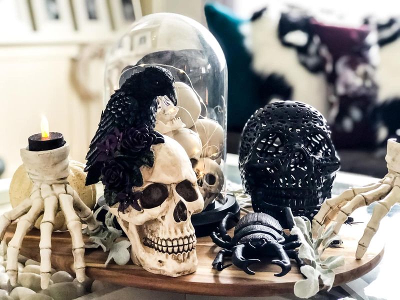 Skeleton Hands Holding Candles