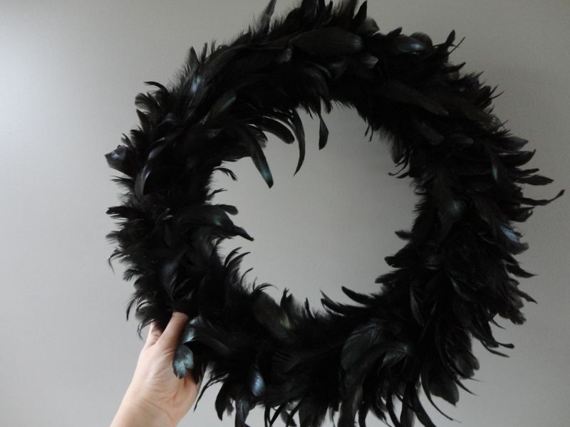Black Feather And Candle Ring Wreath