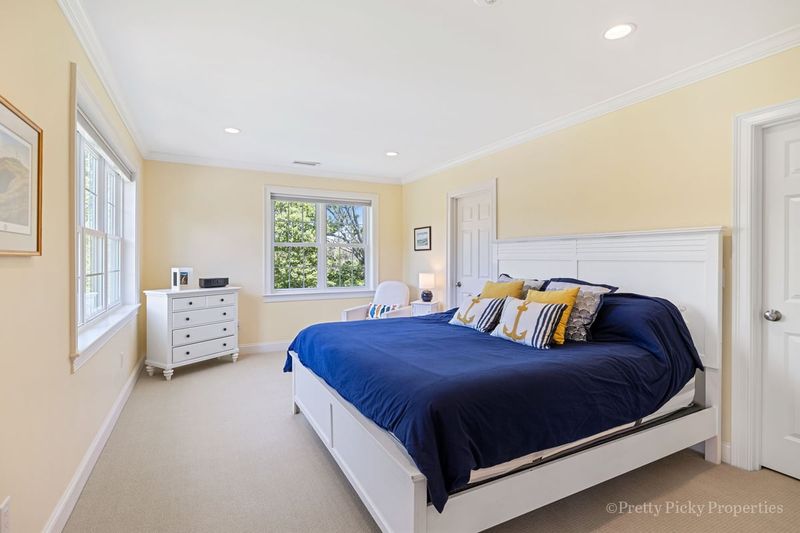 Pale Yellow Guest Room With Vintage Cape Cod Charm In Orleans