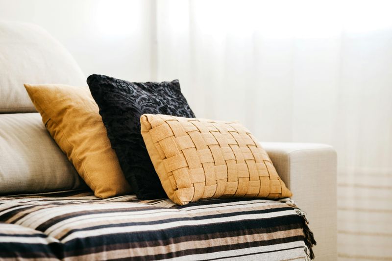 21 Simple Ways To Make Your Home Feel Cozier - Decor Hint Pile On Textured Pillows And Cushions