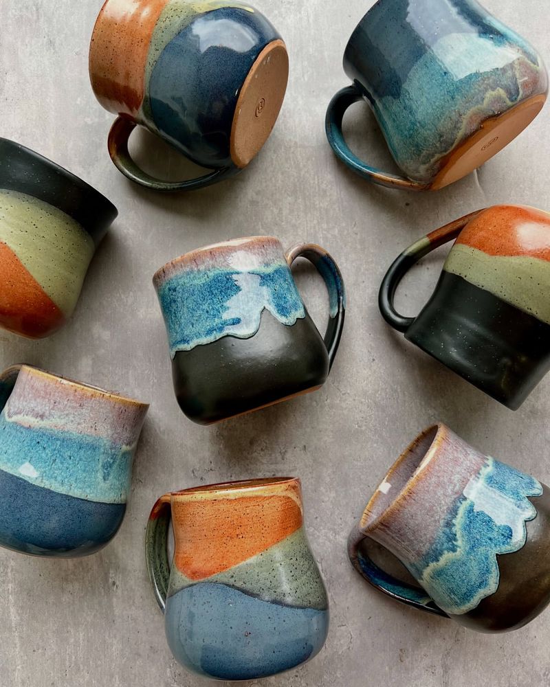 Handmade Pottery Mugs And Seasonal Centerpieces