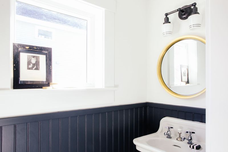 Include Wainscoting Panels With Brass Accents