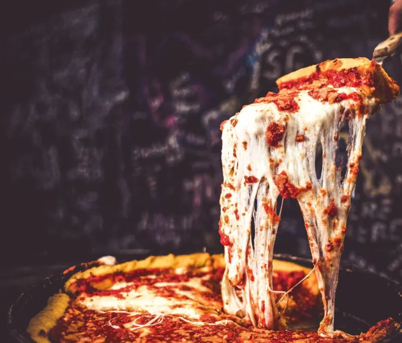10 Local Looking Deep Dish Slice Shops In Illinois You Might Want To Try - Decor Hint Gino's East – Graffiti Walls and Golden Crusts