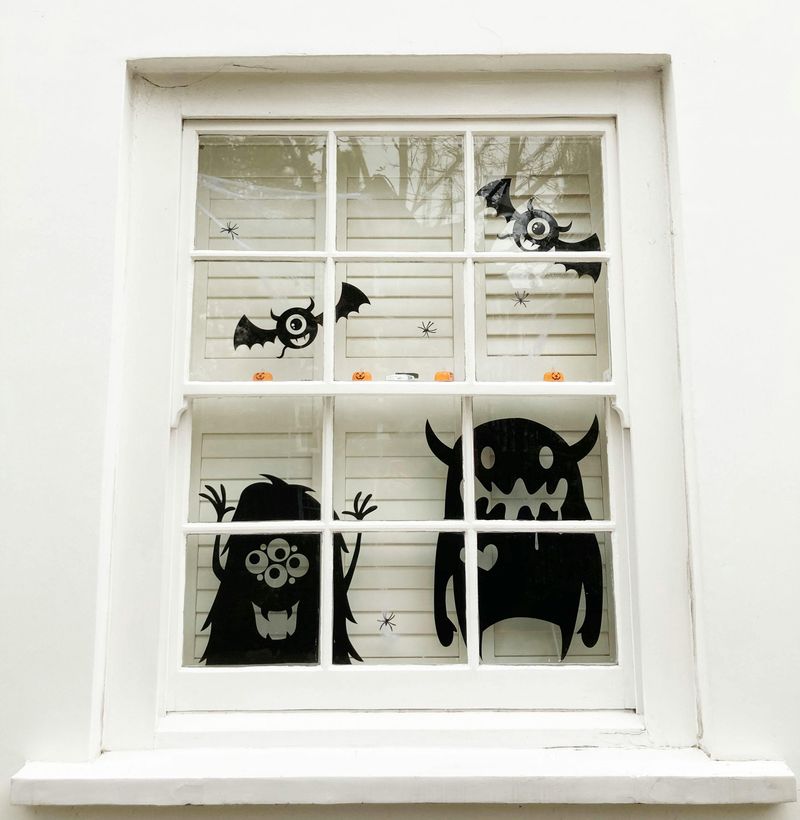 Simple Halloween Decorations That Work In Small Apartments - Decor Hint Spooky Window Clings