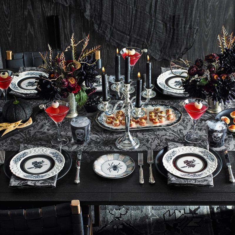 Dark Floral Arrangement With Silverware Detailing