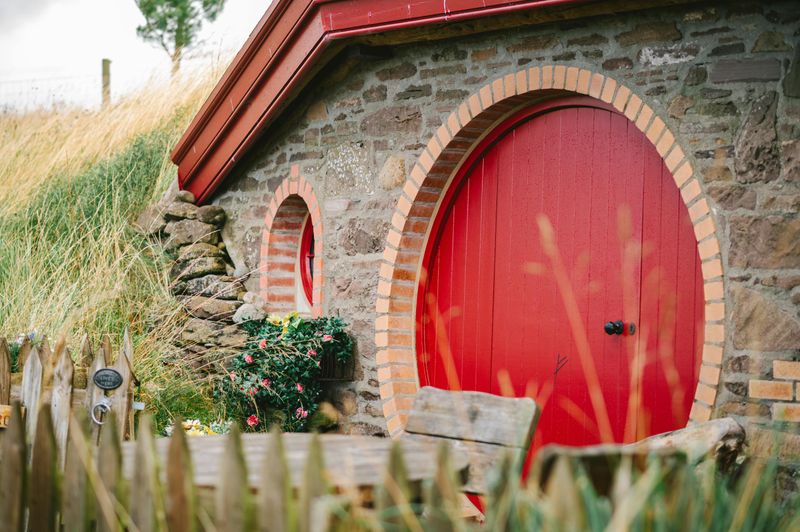 14 Hobbit-Style Homes That Could Inspire Unique Design Ideas - Decor Hint Stone And Wood Blended Houses