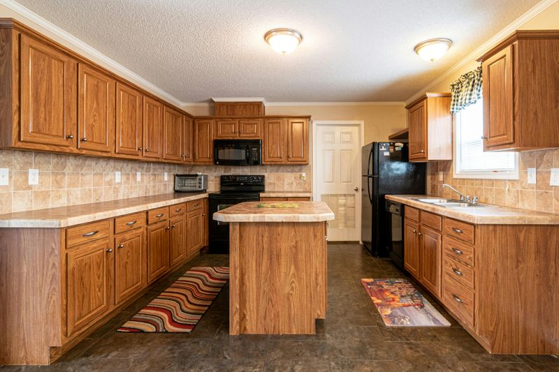 15 Budget-Friendly Kitchen Updates You Can Do Yourself - Decor Hint Add A Kitchen Rug