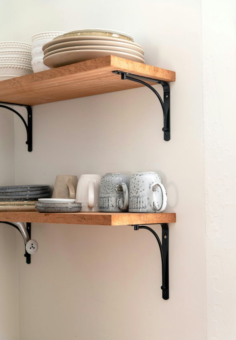 Experts Spot 11 Traditional Kitchens That Could Become The Next Big Thing - Decor Hint Open Shelving with Wooden Brackets