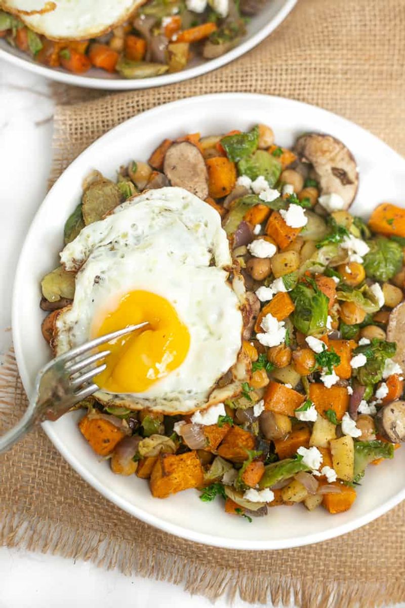 Crispy Root Veggie Hash With Fried Eggs And Hot Sauce