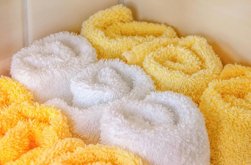 9 Space-Saving Towel Storage Tips That Could Transform Your Bathroom - Decor Hint Roll Towels Instead of Folding