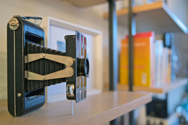 Vintage Cameras On Floating Cubes