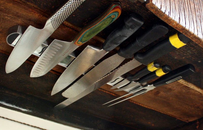 Magnetic Knife Storage Behind Artwork