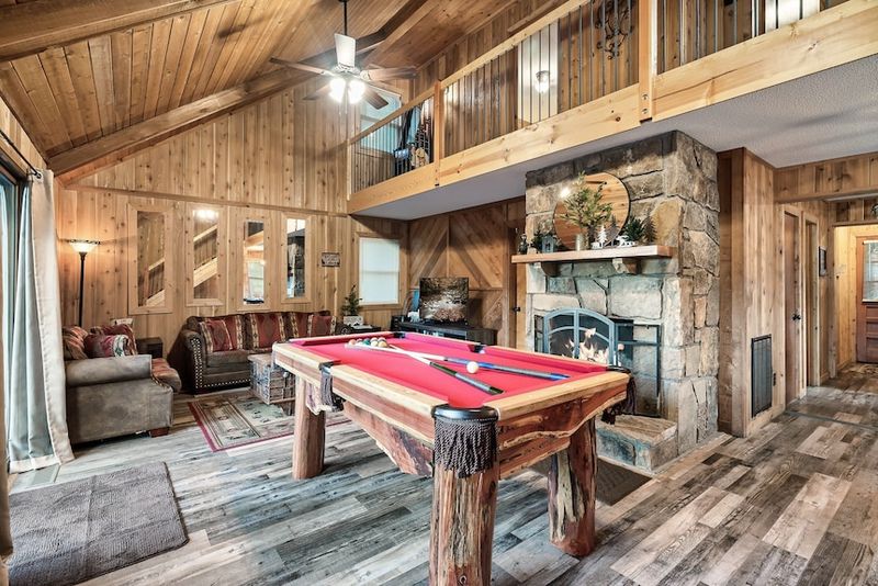 Game Room With Stone Hearth