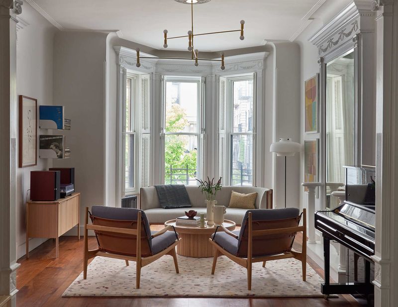 How To Bring The Classic New York Brownstone Look Into Your Own Home - Decor Hint Incorporating Tall Windows With Classic Trim And Molding