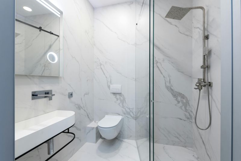 16 Ideas That Could Help Your Tiny Bathroom Look Larger - Decor Hint Use Glass Shower Doors