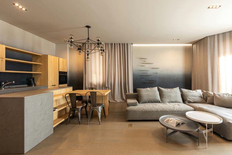 Use consistent flooring throughout connected rooms