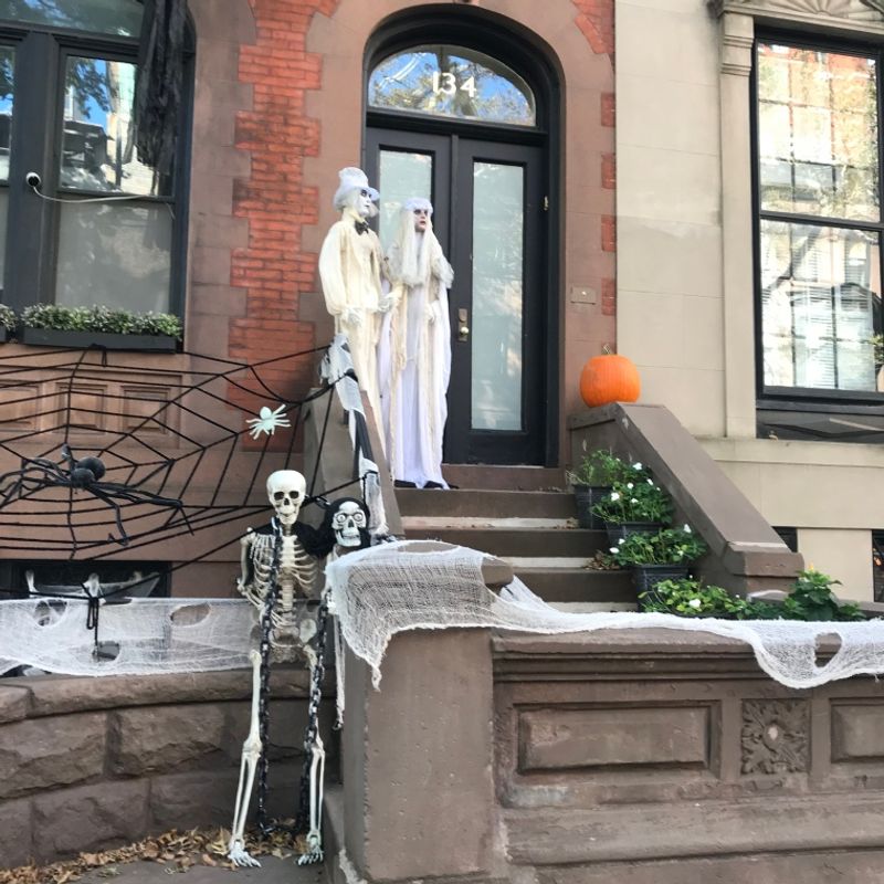 Life-Sized Skeleton Scenes Bring Humor To Historic Steps