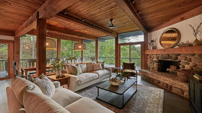 Exposed Wood Beams And Stone Fireplaces