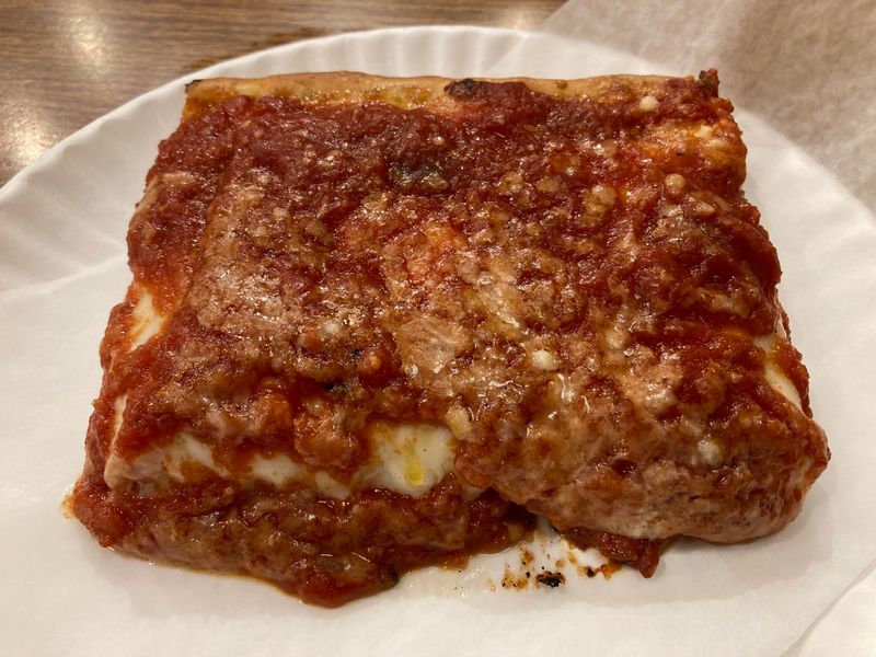 10 New York Pizza Slices That Define Perfection According To Locals - Decor Hint NY Pizza Suprema's Upside-Down Slice