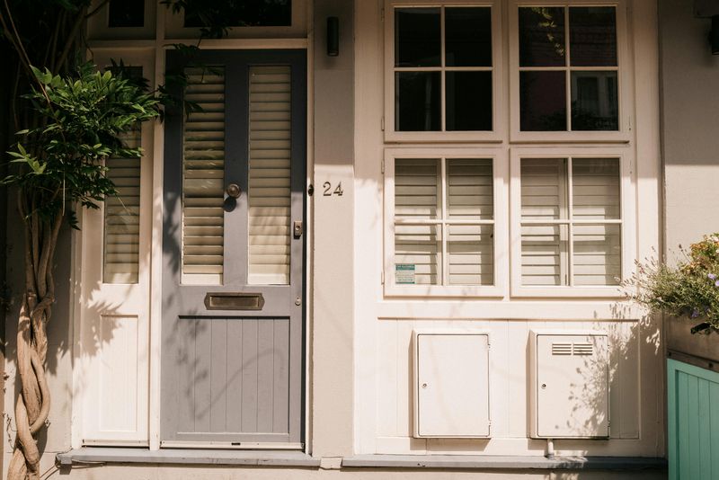 Statement Front Doors In Subtle, Earthy Tones
