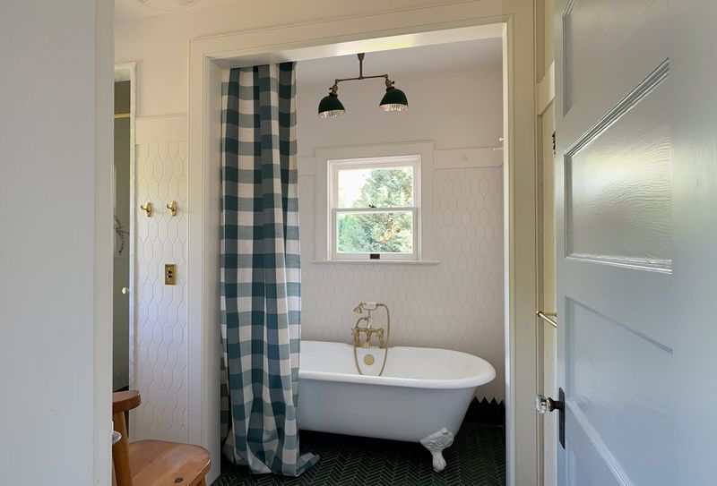Natural Stone Showers And Bold Plaid Curtains