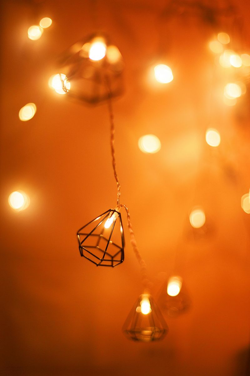 Simple Halloween Decorations That Work In Small Apartments - Decor Hint String Lights With Warm Orange Glow