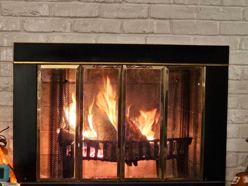 9 Dallas Fireplace Makeover Ideas That Keep The Brick - Decor Hint Glass Fireplace Doors Upgrade