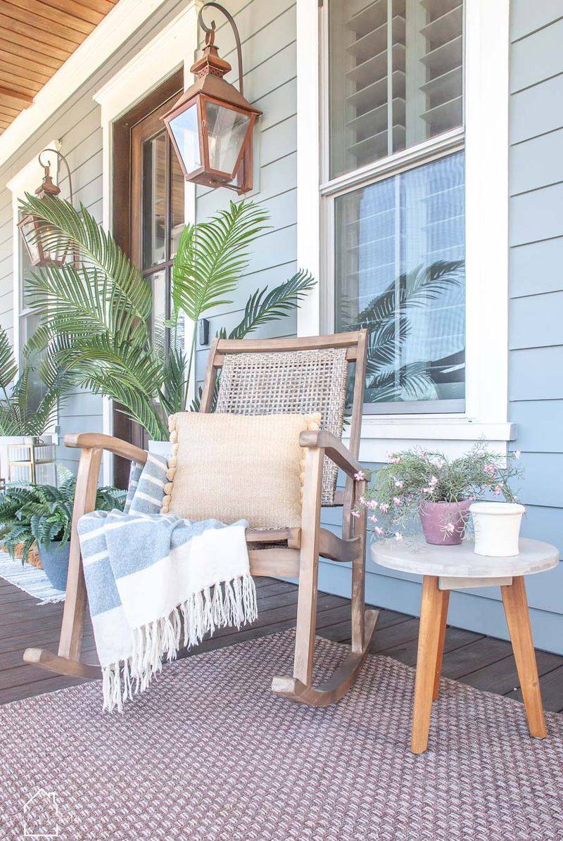 Modern Boho Porch With Woven Rugs