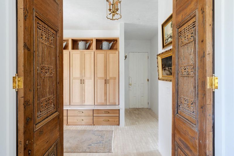 Classic Maple Mudroom With Timeless Brass Hardware