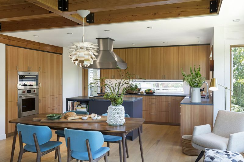 Minimalist Kitchen Anchoring Cozy Living Room