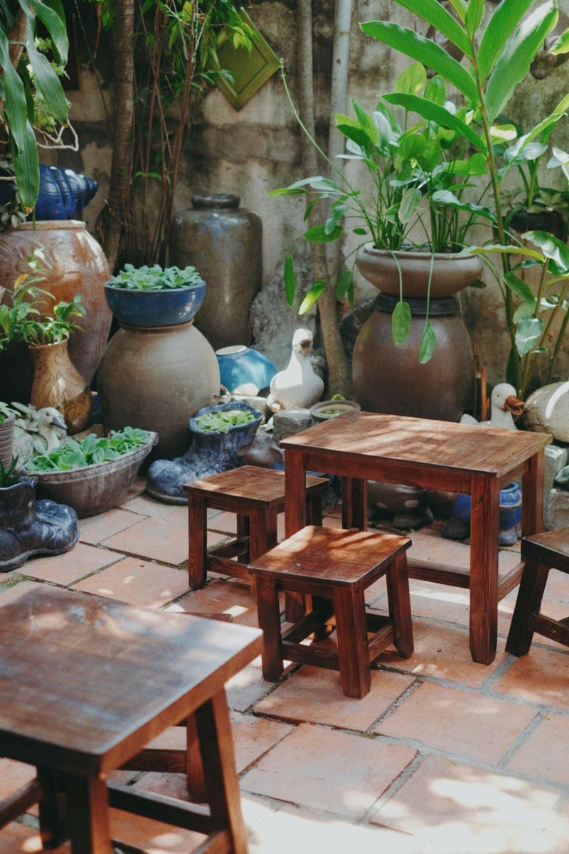 12 Small Investments That May Make Your Backyard A Relaxing Hideaway - Decor Hint Introduce potted plants or flowers