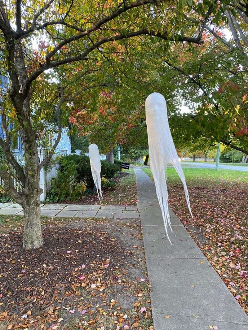 Ghosts Hanging From Trees