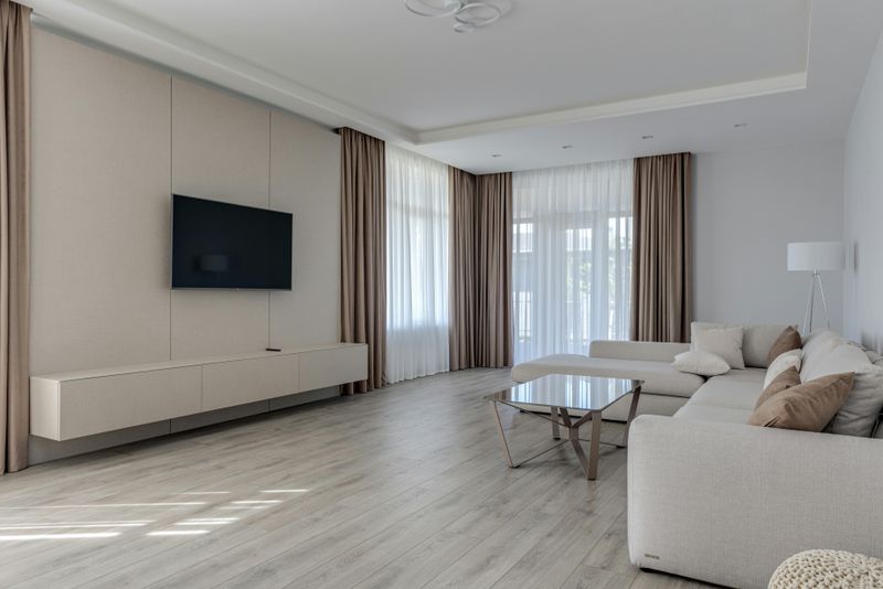 Common Decorating Mistakes To Avoid In Small Living Rooms - Decor Hint Heavy Window Treatments Blocking Light