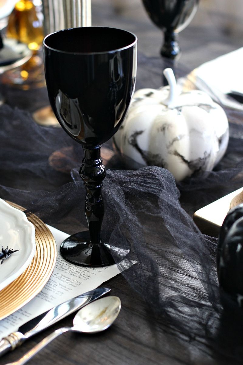Antique Silverware With Black Glassware