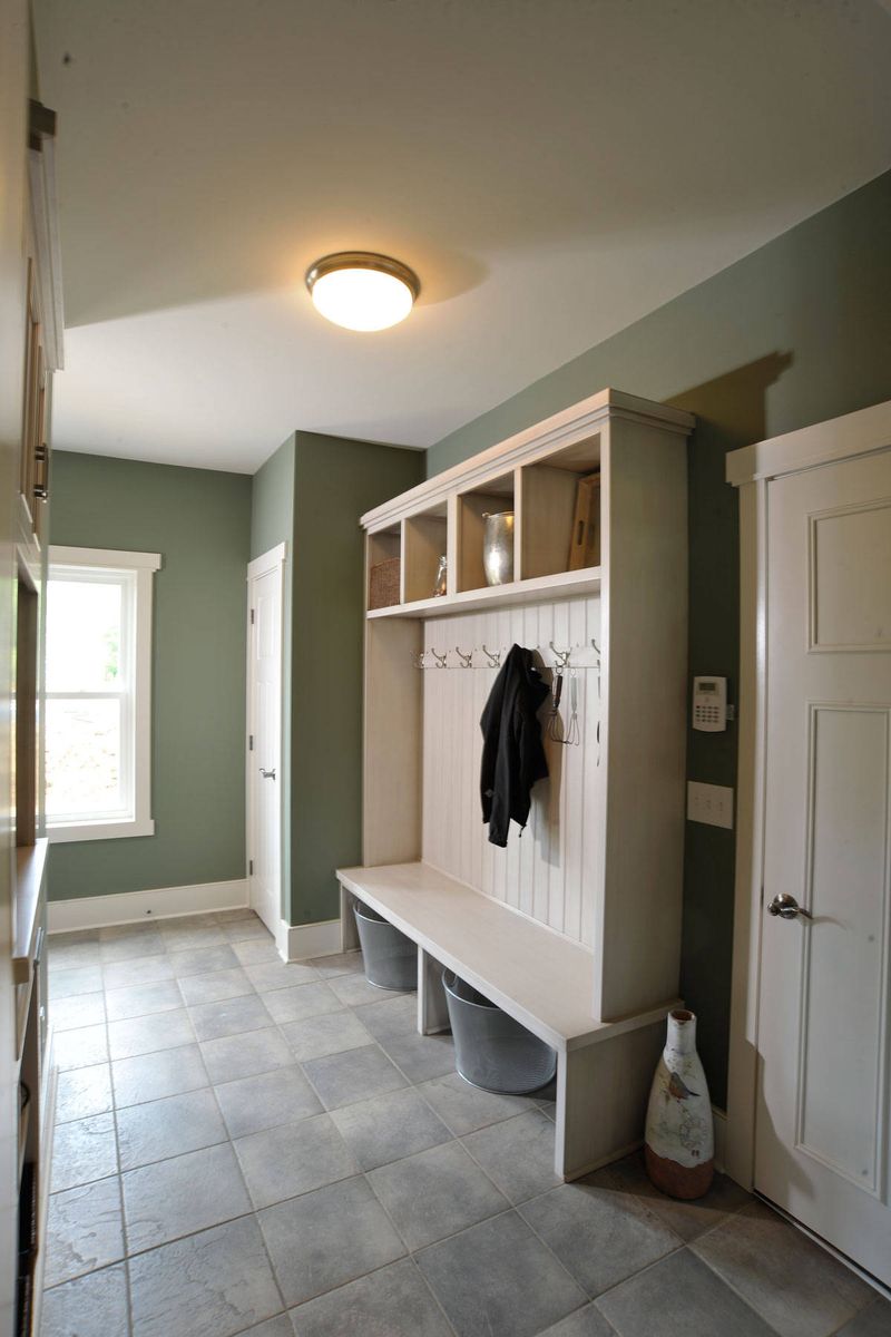 Soft White Built-Ins Against Sage Green Walls Bring Calm 