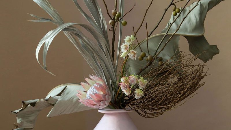 Dried Hydrangeas In Antique Pitchers