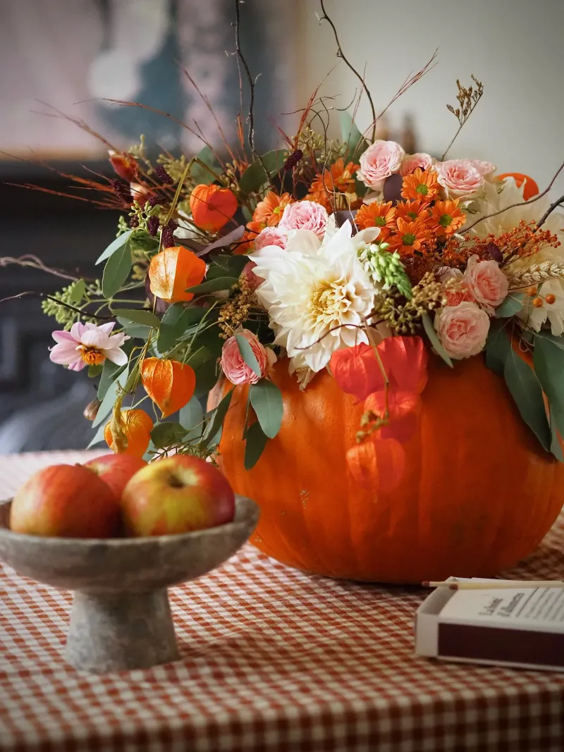 Pumpkin Vases With Seasonal Blooms
