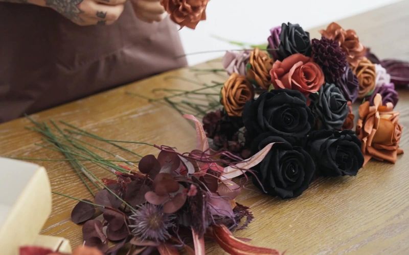 Black-And-Orange Floral Arrangements