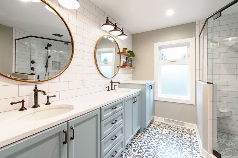 10 Portland Bathrooms With Bold Baby-Blue Touches That Feel Serene - Decor Hint Coastal Cabinet Charm