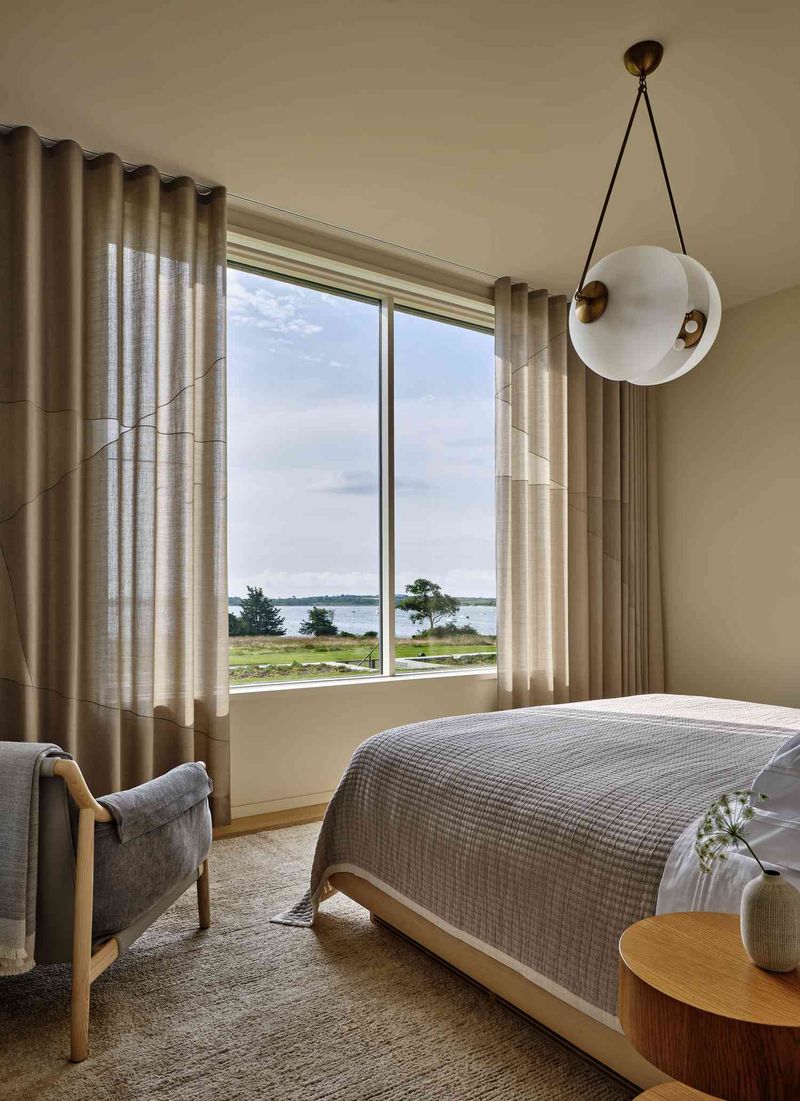 Elegant Minimalism: Double Disc Pendant In A Serene Retreat