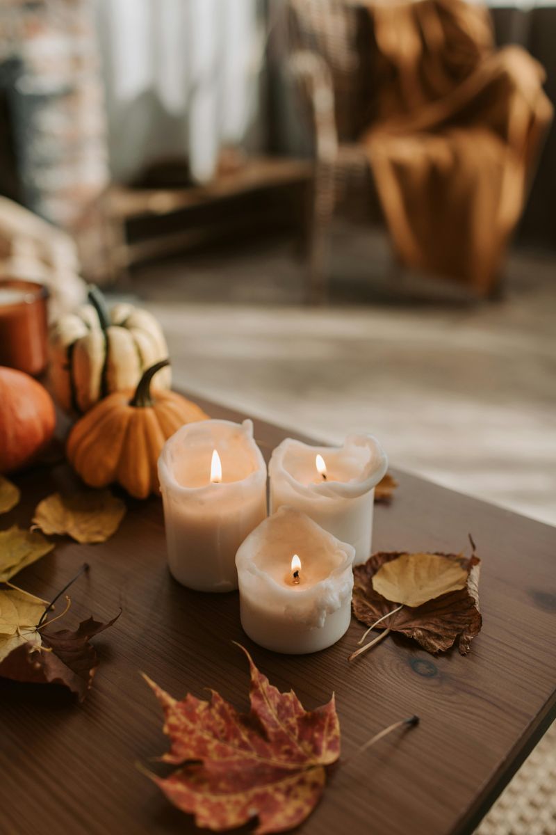 6 Subtle Halloween Touches For People Who Don't Like Over The Top - Decor Hint Candles in Seasonal Colors