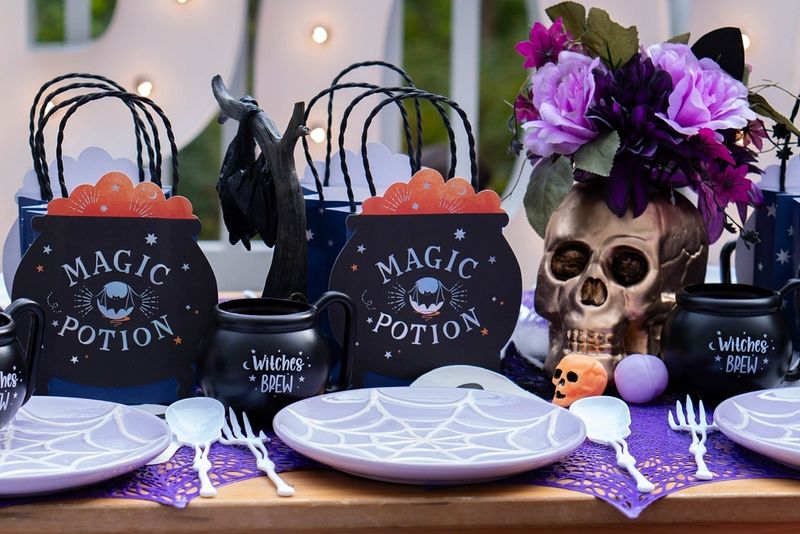 Witch-Themed Potion Table And Cauldron Centerpiece