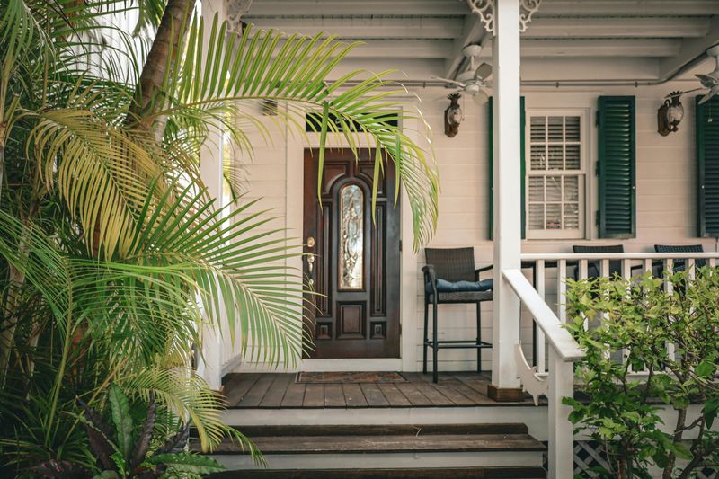 13 Weekend Projects That May Give Your Porch A New Look - Decor Hint Add a new coat of paint to the front door