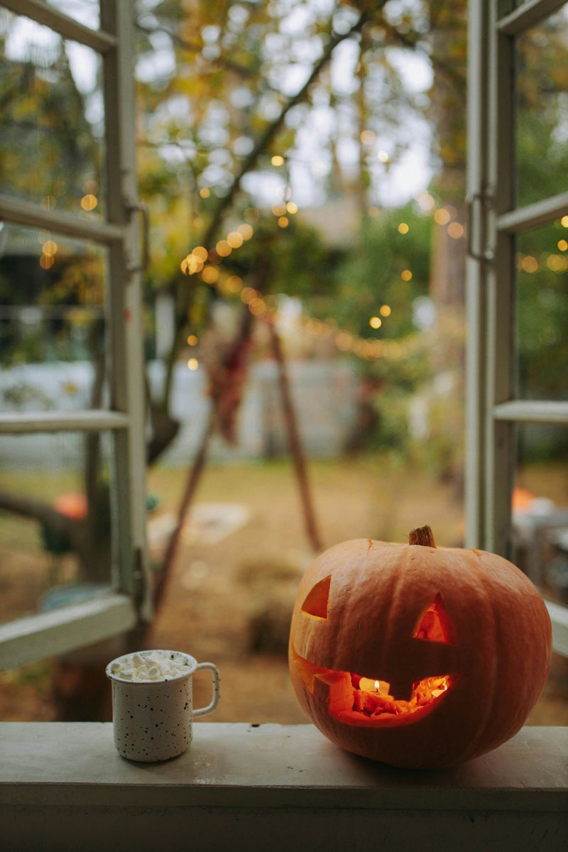 10 Porch Pumpkin Arrangements That Feel Classic Not Cheesy - Decor Hint Candlelit Pumpkin Display