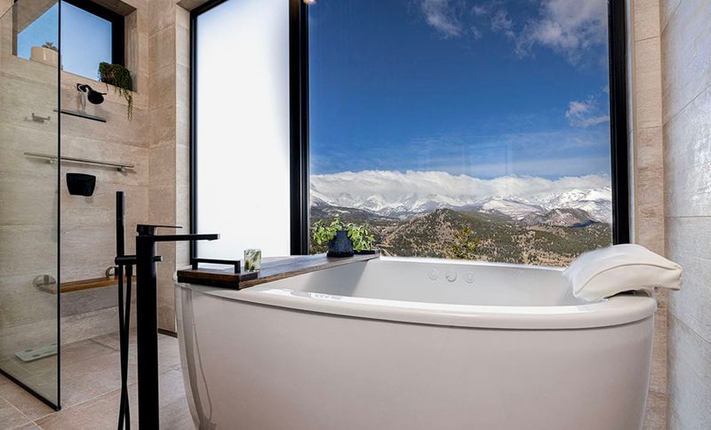 Freestanding Tubs Framed By Mountain Views