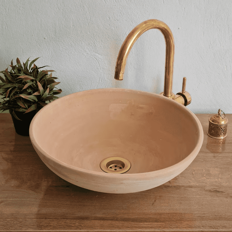 Terracotta Farmhouse Sink With Brass Fixtures