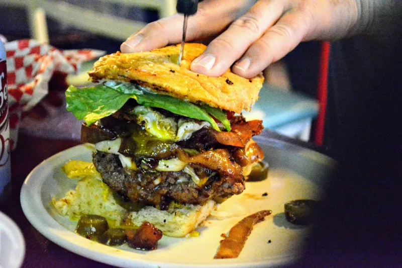 14 Must-Try Texas Burgers That Made Food History - Decor Hint Alamo Springs Café's Jalapeño Cheeseburger