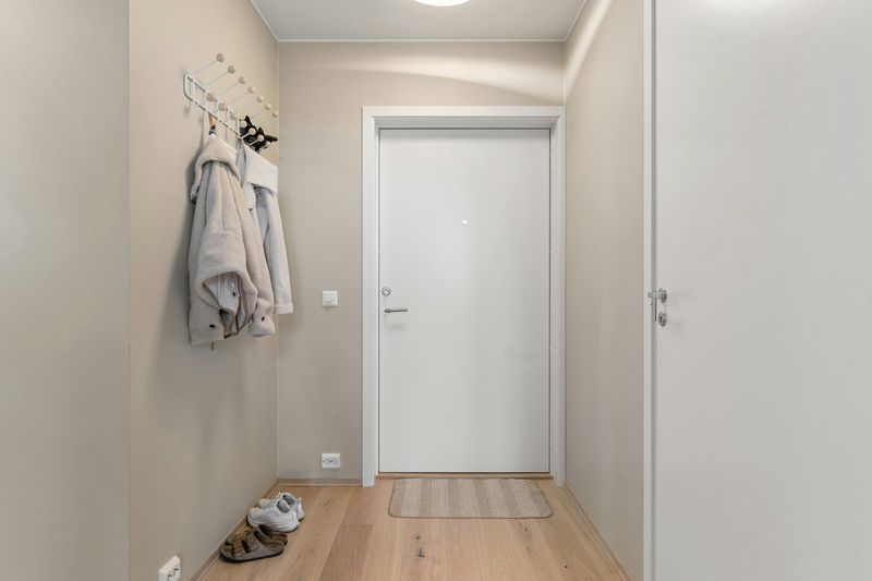 14 Simple Style Tips You Can Use To Make Your Hallway More Inviting - Decor Hint Add A Coat Rack Or Hooks