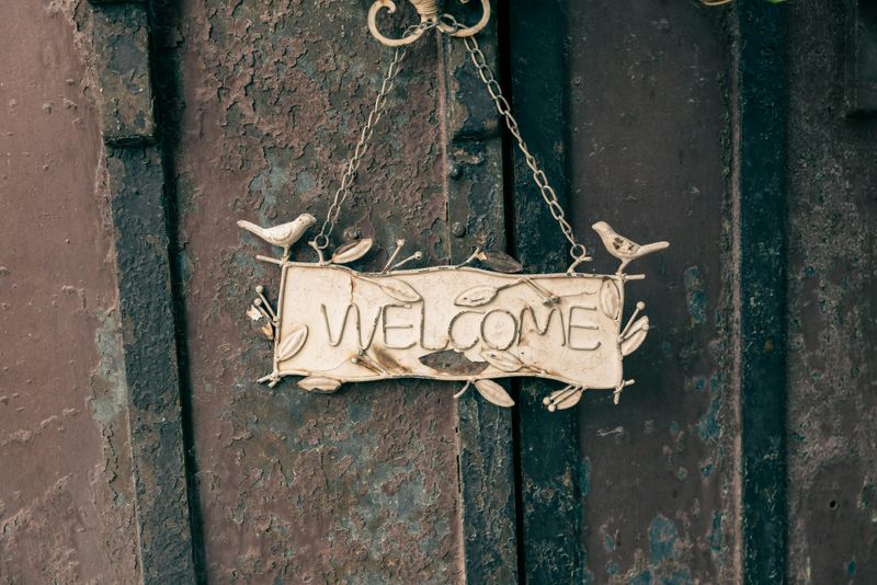 Create A Warm Welcome With These 13 Front Porch Ideas - Decor Hint Hang A Stylish Welcome Sign