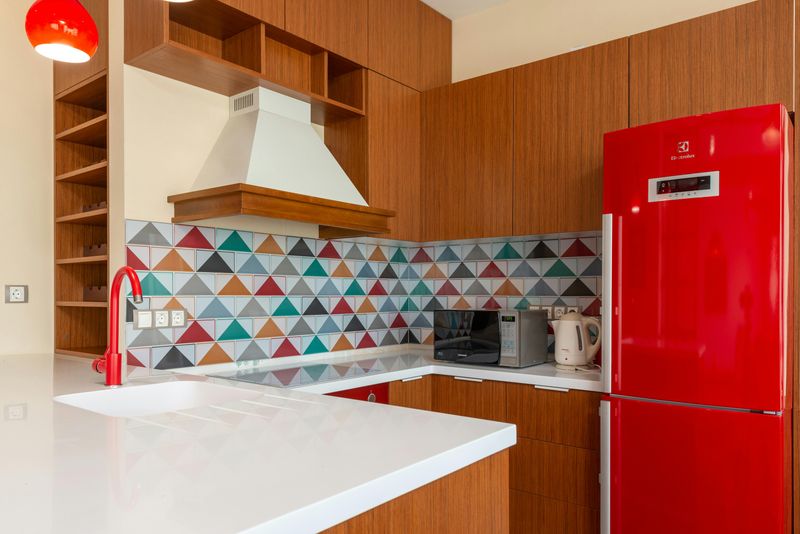 9 Kitchen Tweaks That Could Bring Midcentury Modern Vibes - Decor Hint Geometric Backsplash Tiles